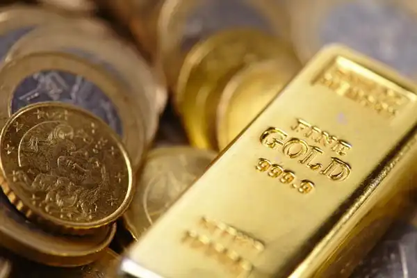 Gold coins and gold bars